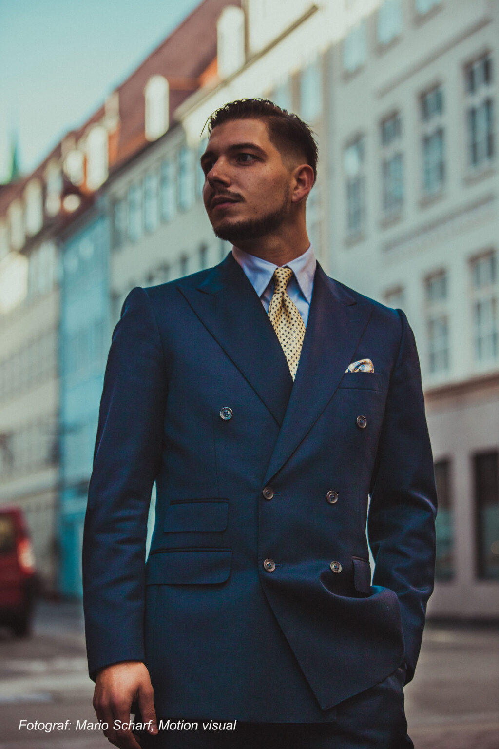 Man in navy suit